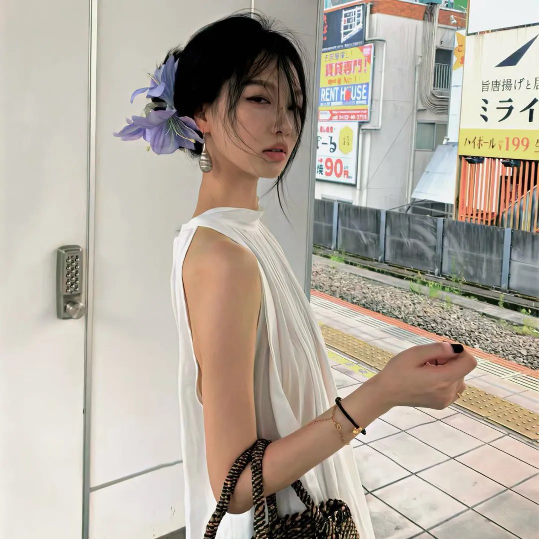 桃花含露又春风